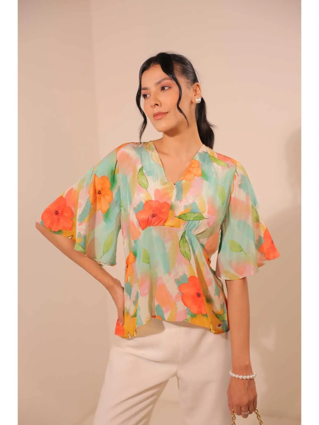 modish natural crepe abstract floral printed stylised V Neck top with bell sleeve. - Multi