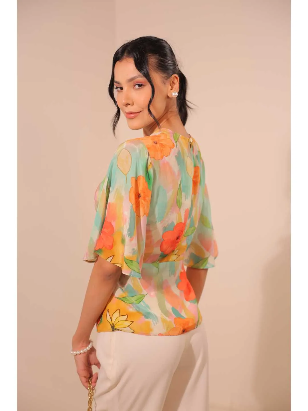 modish natural crepe abstract floral printed stylised V Neck top with bell sleeve. - Multi