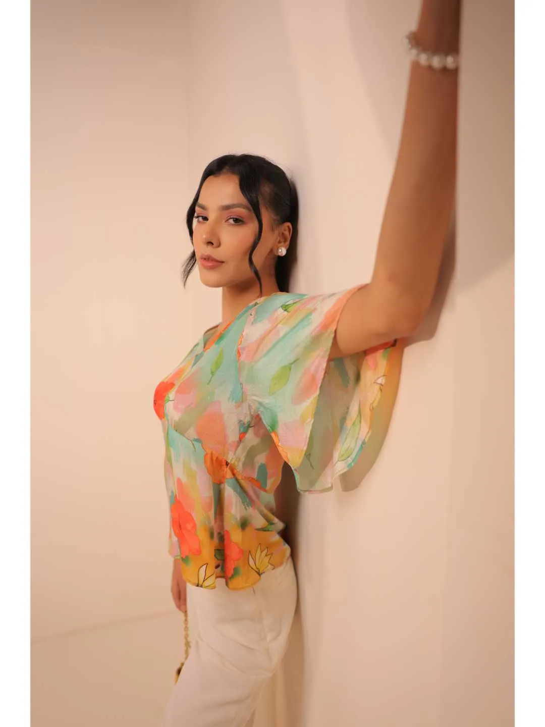 modish natural crepe abstract floral printed stylised V Neck top with bell sleeve. - Multi