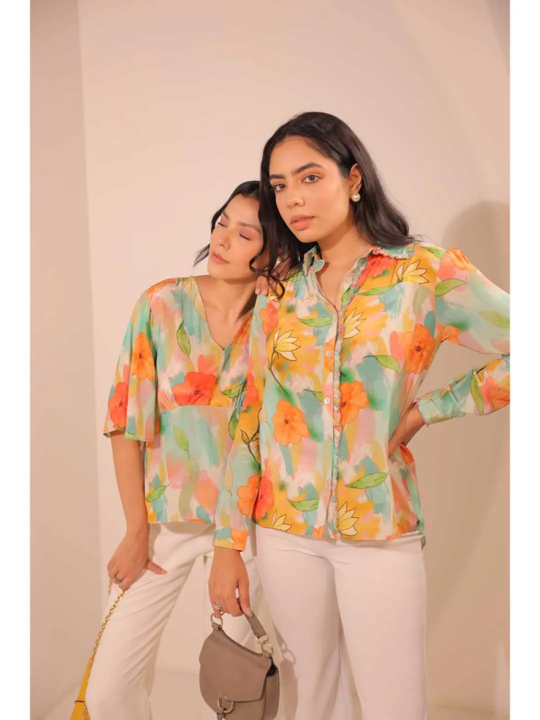 modish natural crepe abstract floral printed stylised V Neck top with bell sleeve. - Multi